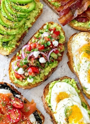 Delicious avocado toast topped with fresh ingredients, perfect for breakfast