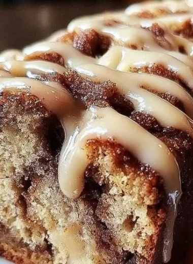 Delicious Cinnamon Roll Banana Bread with a swirl of cinnamon and banana flavor.