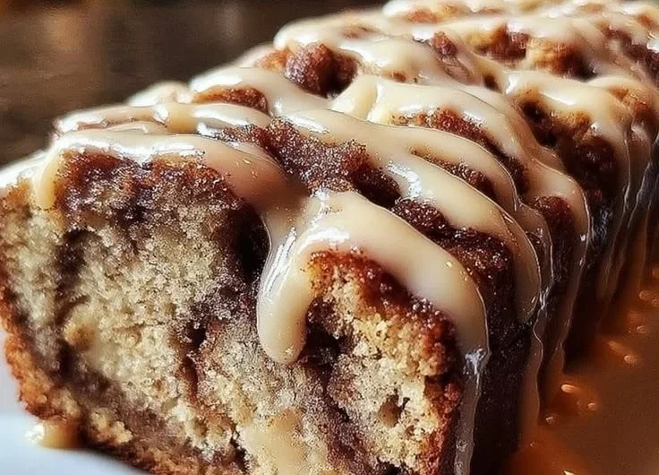 Delicious Cinnamon Roll Banana Bread with a swirl of cinnamon and banana flavor.