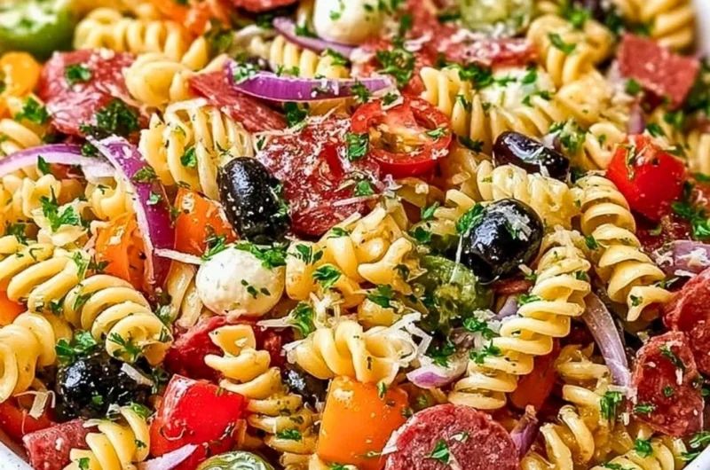 Bowl of easy Italian pasta salad with fresh vegetables and dressing