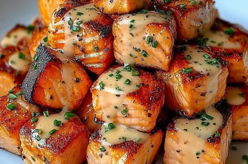 Crispy Bang Bang Salmon Bites served with a spicy dipping sauce