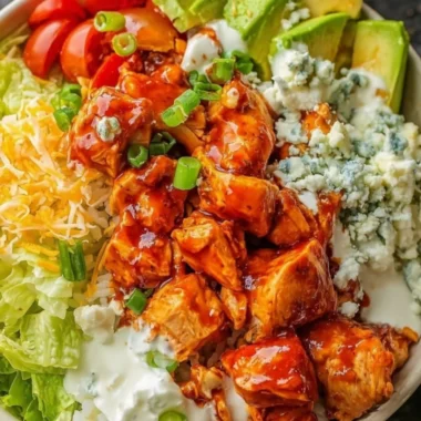 Cozy Buffalo Chicken Bowls with tender chicken, rice, and spicy sauce