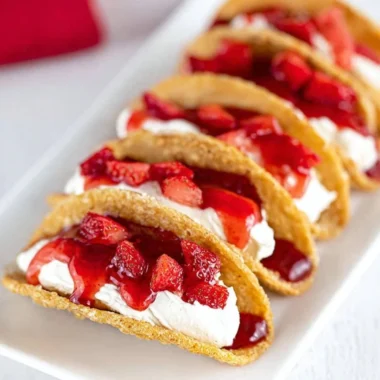 Easy cheesecake tacos filled with creamy cheesecake and fresh toppings