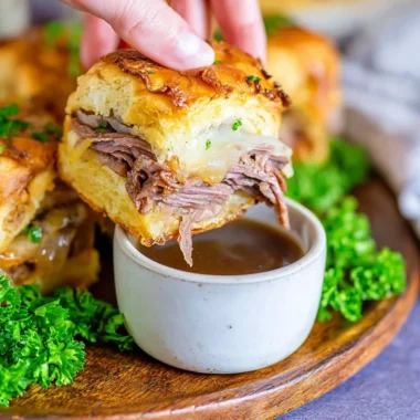 Delicious French Dip Sliders with juicy beef and savory dipping sauce