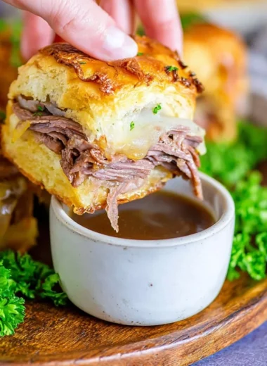 Delicious French Dip Sliders with juicy beef and savory dipping sauce