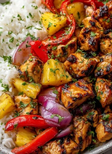 Hawaiian Chicken Sheet Pan with colorful vegetables and pineapple