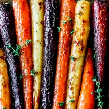 Honey roasted colorful carrots garnished for a vibrant side dish