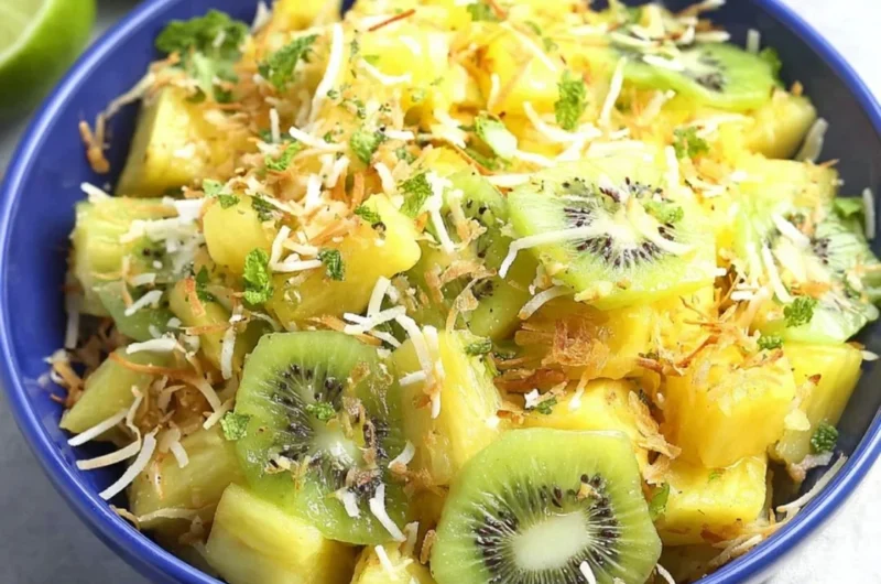 Delicious pineapple kiwi salad with fresh fruits in a bowl