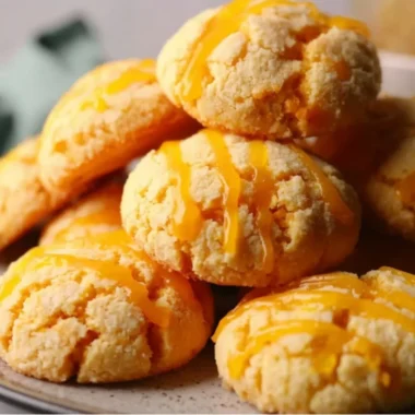 Delicious tropical mango cookies on a plate with fresh mango slices