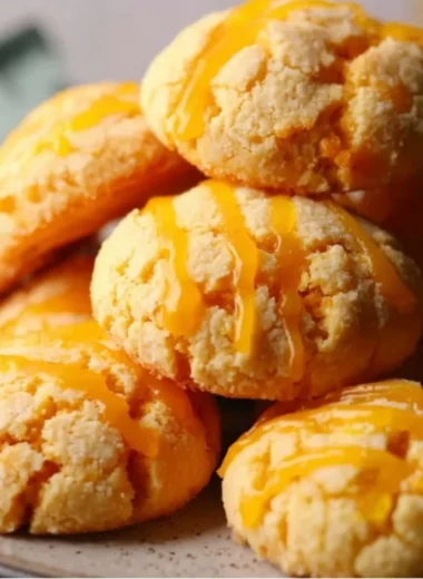 Delicious tropical mango cookies on a plate with fresh mango slices