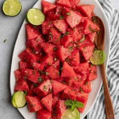 Delicious Watermelon Mojito Salad with mint and lime on a plate