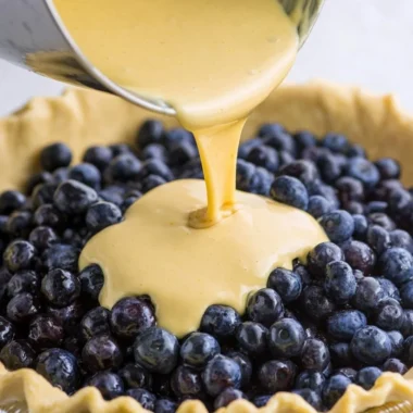 Delicious Blueberries Cream Pie topped with fresh blueberries