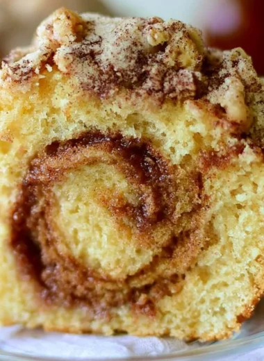 Deliciously baked Cinnamon Swirl Coffee Cake with a rich cinnamon swirl topping.