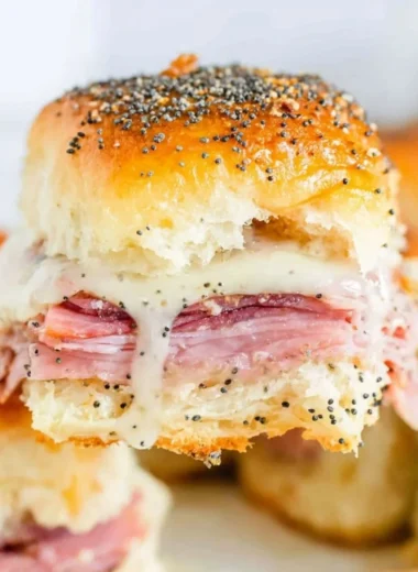 Delicious ham and cheese sliders served on a platter