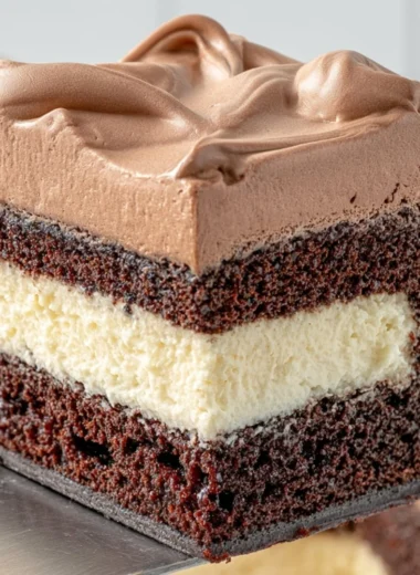 Slice of Italian Love Cake with rich layers and frosting