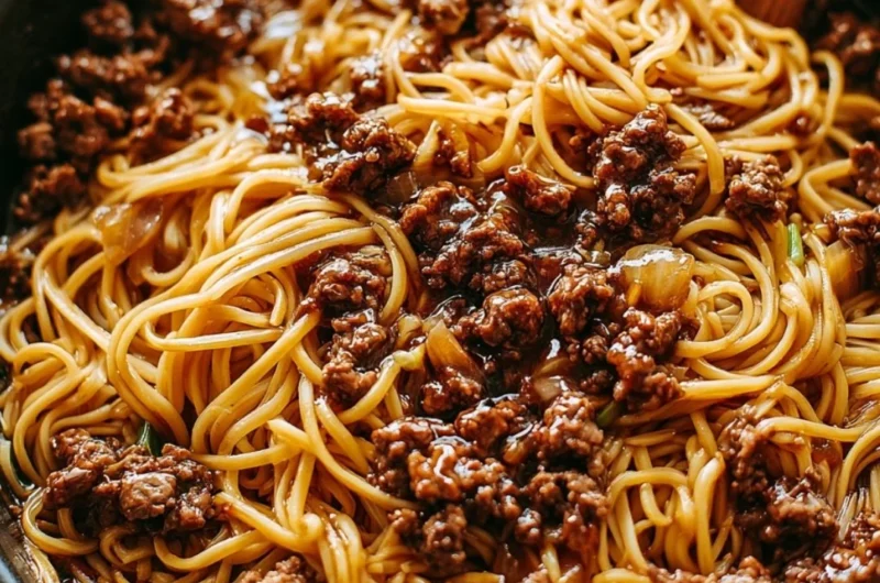 Delicious Mongolian ground beef noodles served in a bowl with colorful vegetables