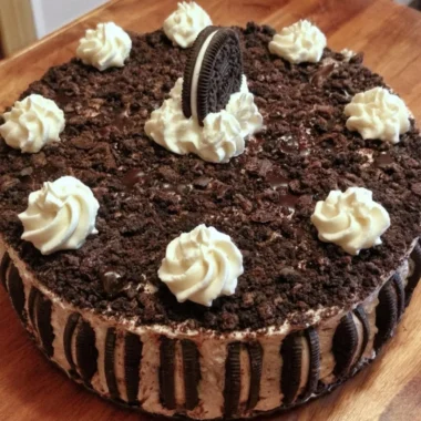 Oreo Easy Ice Cream Cake served with chocolate drizzle and crushed cookies