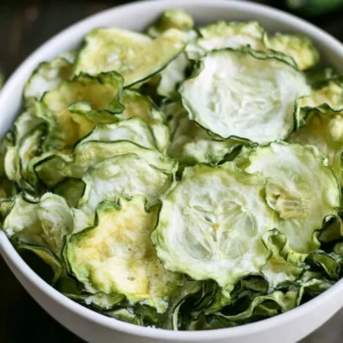 Crispy homemade salt and vinegar cucumber chips served in a bowl