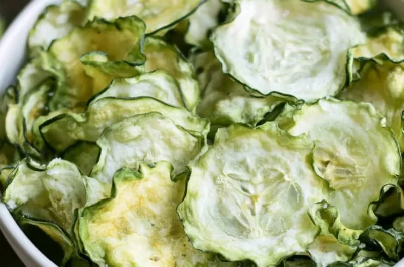 Crispy homemade salt and vinegar cucumber chips served in a bowl