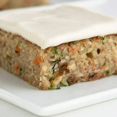 Delicious freshly baked zucchini bars topped with cream cheese frosting