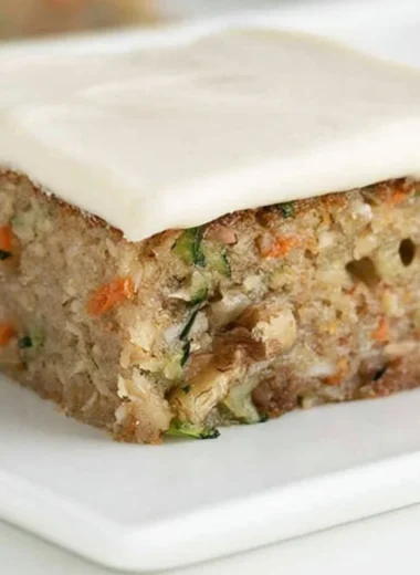 Delicious freshly baked zucchini bars topped with cream cheese frosting
