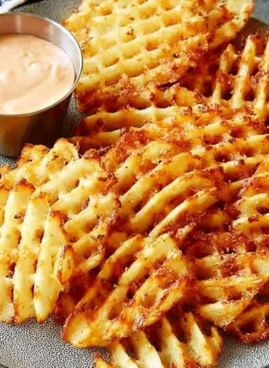 Crunchy waffle fries served with a flavorful homemade dipping sauce