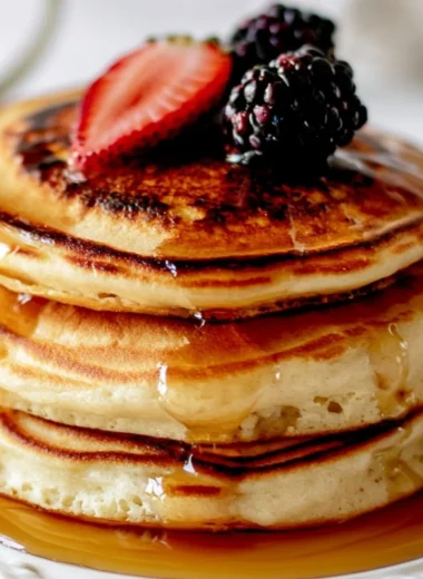 Cozy fluffy pancakes served on a plate for a delicious breakfast