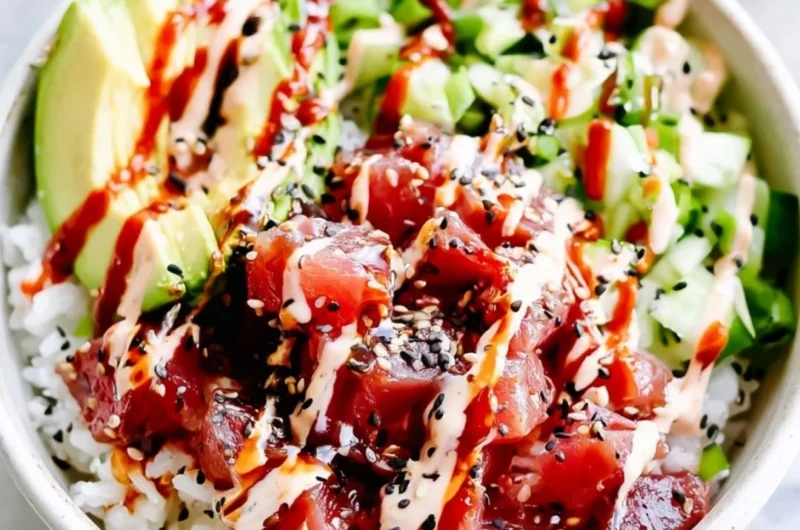 Cozy spicy tuna poke bowl with fresh ingredients and spicy sauce