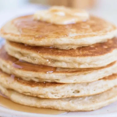 Delicious easy sourdough discard pancakes stacked on a plate