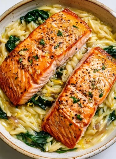 Seared salmon served with lemon orzo for a bright and flavorful dish